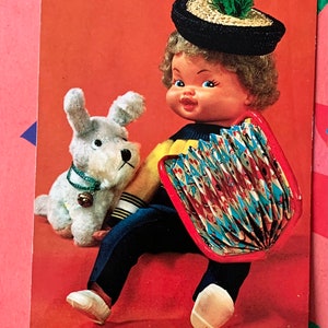 Ongebruikte Vintage jaren '60 Ansichtkaart Nederlandse Wildebras Ricky Boy Doll en Puppy no1.