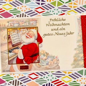 Ongebruikte vintage kerstkaart Lisi Martin Santa die piano speelt