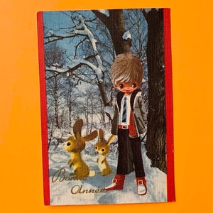 Cartolina d'epoca usata Felice Anno Nuovo Boy Bunny Snow