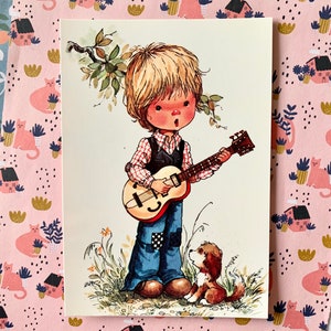 Ongebruikte Vintage Ansichtkaart jaren 70 Jongen met Gitaar Mary May