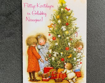 Vintage jaren '70 Holly Hobbie kerstkaart wenskaart rond de kerstboom