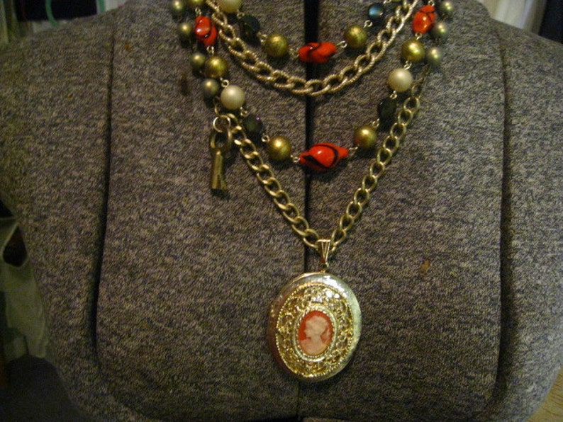 VINTAGE upcycled Timeless Beauty Cameo Locket Assemblaged Multi Stranded Necklace with a brass Skeleton Key