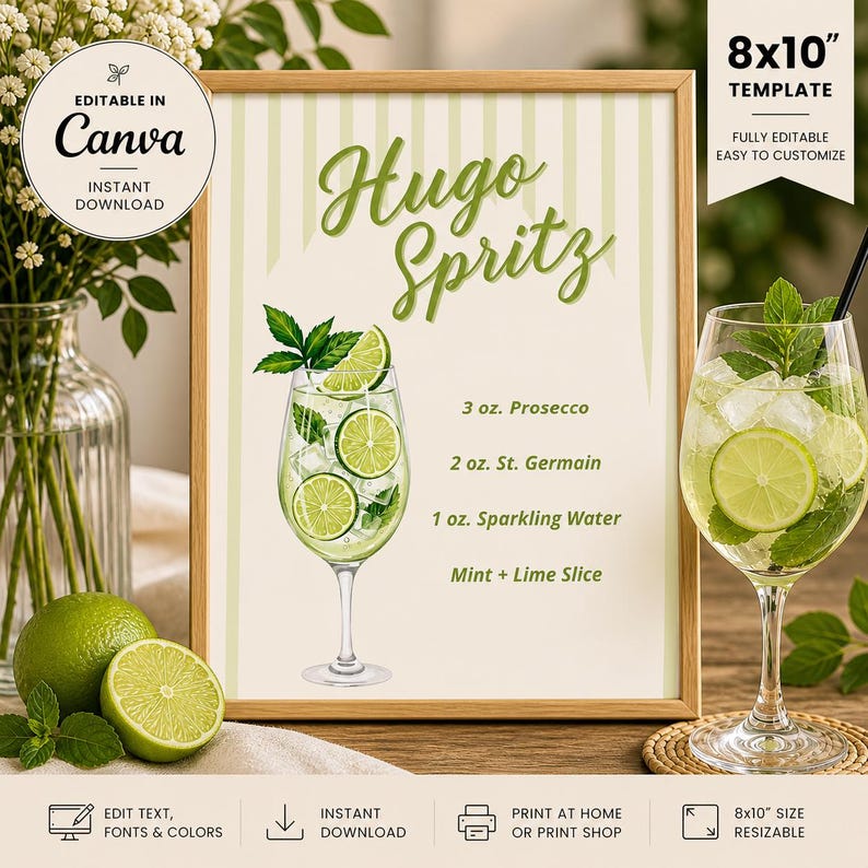 May include: A framed print with a Hugo Spritz cocktail recipe. The recipe includes Prosecco, St. Germain, and sparkling water, garnished with mint and lime. The print is 8x10 inches and fully editable.