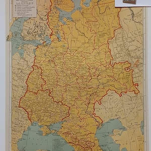 May include: A vintage map of the European part of the Soviet Union, showing the borders of the constituent republics, major cities, and railroads. The map is printed on a yellowed paper with a blue and green color scheme. The map is titled "Union of Soviet Socialist Republics, European Part".