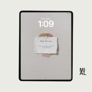 May include: A digital tablet displaying a minimalist wallpaper with the time 1:09 and the date Friday, August 1. A torn paper note reads "Daily Reminder: To live each day as its own - do it all in love."