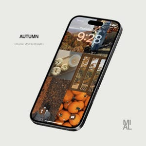 May include: A black smartphone displays an autumn-themed digital vision board. The screen features a collage of fall images, including pumpkins, a window, and a scenic landscape. The text "AUTUMN DIGITAL VISION BOARD" is displayed on the phone.