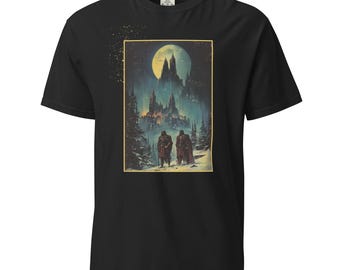 May include: Black t-shirt with a graphic print of a castle in a snowy landscape under a full moon. Two figures are walking towards the castle.
