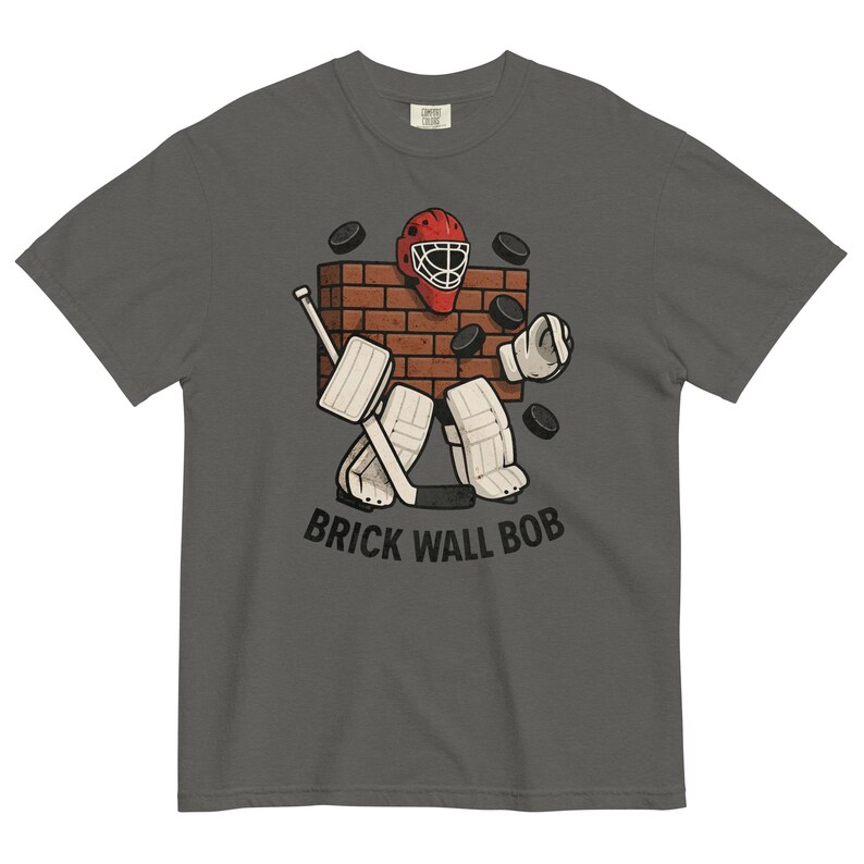 Brick Wall Bob Goalie Tee – Funny Hockey Goalie Shirt – Vintage Style Hockey T-Shirt – Retro Goalie Graphic Tee – Ice Hockey Gift for Fans