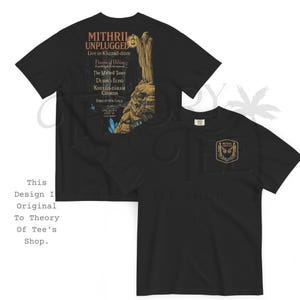 May include: Black t-shirts with a graphic design. One shirt features the text "Mithril Unplugged" with a detailed illustration. The other shirt has a small emblem with an owl design. Both shirts are from Theory Of Tee's Shop.