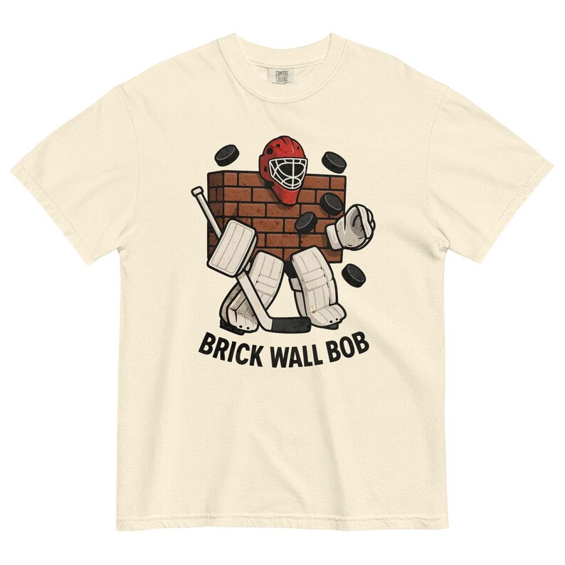 Brick Wall Bob Goalie Tee – Funny Hockey Goalie Shirt – Vintage Style Hockey T-Shirt – Retro Goalie Graphic Tee – Ice Hockey Gift for Fans