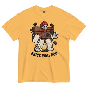 Brick Wall Bob Goalie Tee – Funny Hockey Goalie Shirt – Vintage Style Hockey T-Shirt – Retro Goalie Graphic Tee – Ice Hockey Gift for Fans