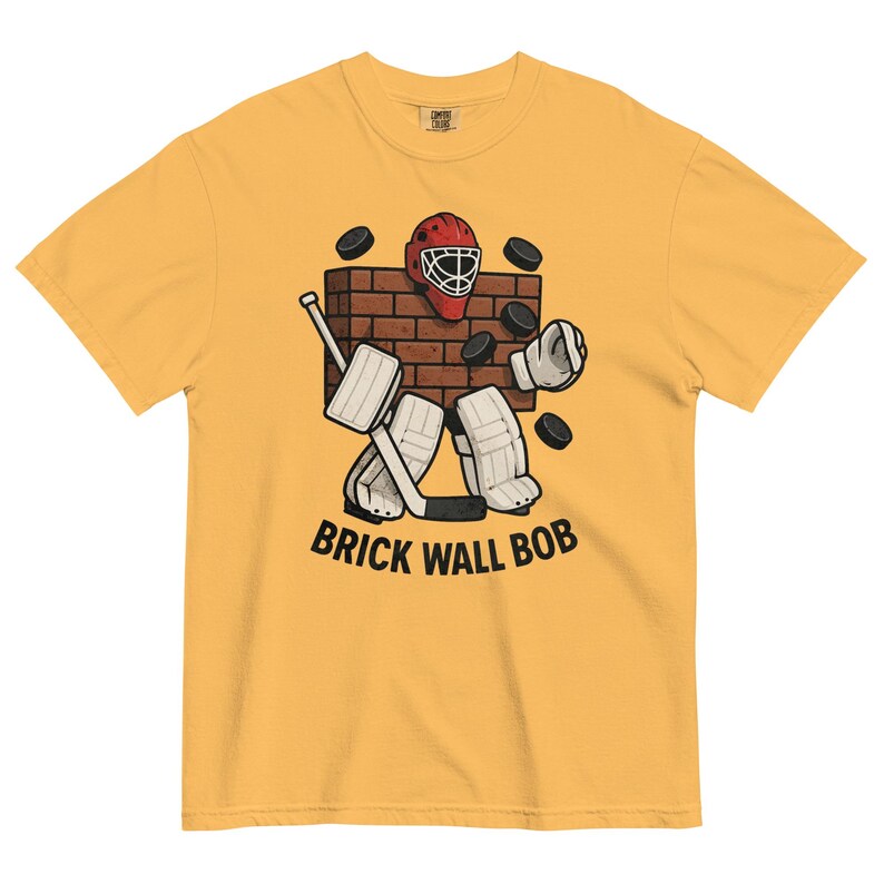 Brick Wall Bob Goalie Tee – Funny Hockey Goalie Shirt – Vintage Style Hockey T-Shirt – Retro Goalie Graphic Tee – Ice Hockey Gift for Fans
