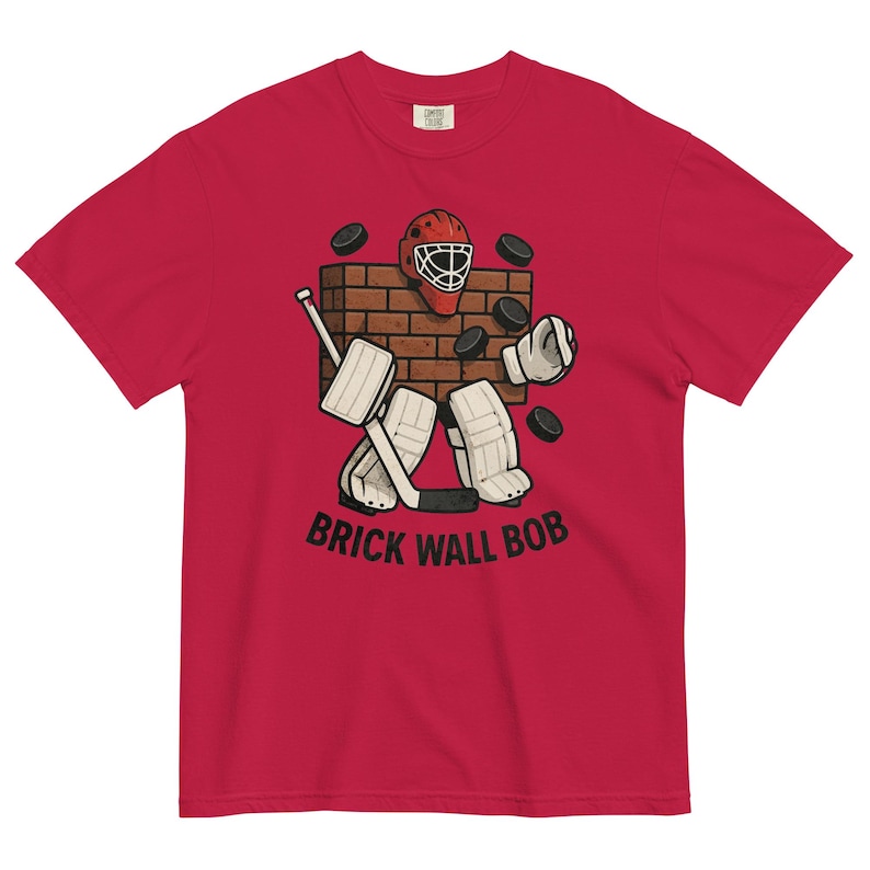Brick Wall Bob Goalie Tee – Funny Hockey Goalie Shirt – Vintage Style Hockey T-Shirt – Retro Goalie Graphic Tee – Ice Hockey Gift for Fans