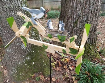 Dinnertime whirligig with Tufted Titmouse mama bird and babies