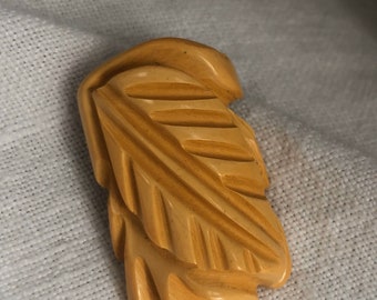 Butterscotch Bakelite Dress Clip Deeply Carved Leaf Design