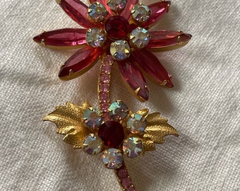 Juliana Pink Rhinestone Flower Brooch Red and Aurora Borealis Accents Gold Metal Leaves.