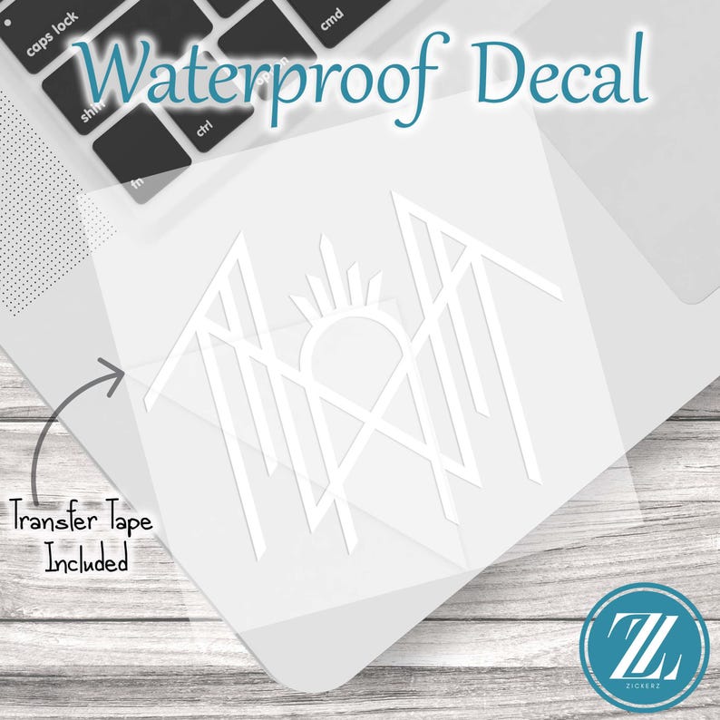 May include: A white waterproof decal featuring a geometric line art design of a sun rising over mountain peaks. The decal includes transfer tape and is displayed on a laptop surface. The text Waterproof Decal and Transfer Tape Included is visible.