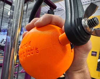 The ORANGE HANDLE! Imperfect shape, feels very ergonomic. 1 of a kind. Durable. Hefty. Includes spacers, fun handle, armwrestling, gym