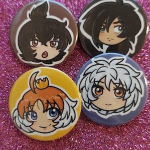 May include: Four round buttons with anime-style character illustrations. The buttons feature characters with various hair colors, including brown, black, orange, and white, set against backgrounds of brown, black, yellow, and blue.