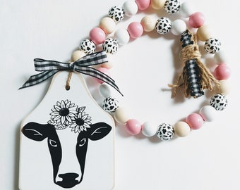 Cow Head Beaded Garland Decor. Floral Cow Farmhouse inspired beaded garland with tassel and ribbon. Farmhouse Spring Decor. TierTray Decor