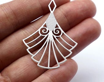 May include: Silver pendant with a geometric design featuring a fan-shaped pattern and a diamond-shaped top.