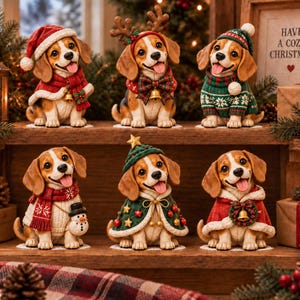 May include: Six beagle figurines dressed in Christmas attire, including Santa hats, reindeer antlers, festive sweaters, and capes with bells, stars, and a small snowman accent. Each puppy has brown and white fur, floppy ears, and an open-mouthed smile.