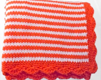 Knitted Baby Blanket in thin stripes of bright orange and white with scalloped border / unisex baby blanket / Orange color nursery