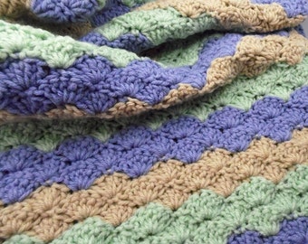 Crib Size Crochet Baby Blanket in stripes of purple, green and beige
