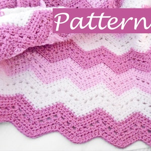 May include: A pink and white crocheted blanket with a chevron pattern. The blanket is folded in half and the word "Pattern" is written in pink on a purple background.