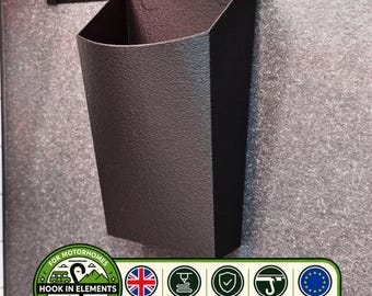 Contenedor de pared compatible con gancho Hymer en sistema de riel de pared multifuncional.
