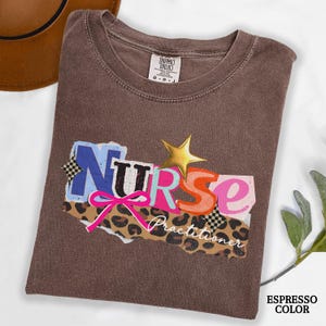 May include: A set of three ceramic mugs with a speckled, matte finish. The mugs are in shades of cream, light gray, and dark gray. Each mug has a simple, minimalist design, perfect for coffee or tea.