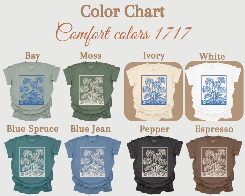 May include: A color chart displays eight t-shirts in various colors: Bay, Moss, Ivory, White, Blue Spruce, Blue Jean, Pepper, and Espresso. Each shirt features a blue and white botanical design within a rectangular frame. The text "Color Chart" and "Comfort colors 1717" are at the top.