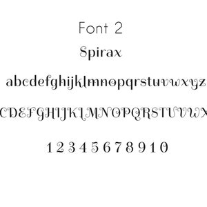 Example of spirax font, black text on white background. Example of a font for engraving a personalised message.