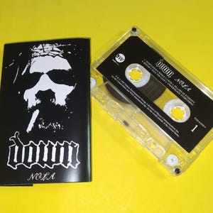 DOWN - NOLA Cassette tape