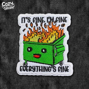 May include: Embroidered patch featuring a green dumpster on fire with a smiling face. The patch has the text "IT'S FINE, I'M FINE, EVERYTHING'S FINE" in black lettering. The patch is outlined in white.