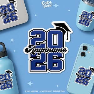 May include: A blue and white graduation sticker with the text "20 Anynname 26" and a graduation cap. The sticker is displayed on a laptop, phone, water bottle, and tumbler. The background is light blue.
