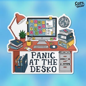 May include: A sticker featuring a cartoon illustration of a messy desk with a computer, a lamp, a disco ball, and stacks of papers. The text "PANIC AT THE DESKO" is written below the desk.