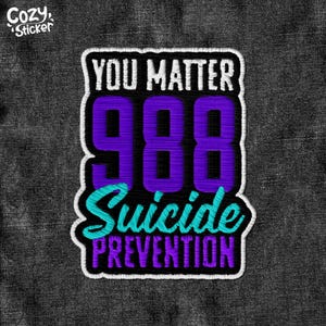 May include: White embroidered patch with the text "You Matter 988 Suicide Prevention" in purple and teal lettering on a denim background.
