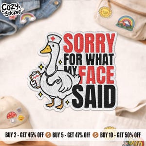 May include: Embroidered patch with a cartoon goose in a nurse's cap and stethoscope, holding a chart. The patch reads "SORRY FOR WHAT MY FACE SAID" in red and black lettering. Small yellow stars surround the goose.