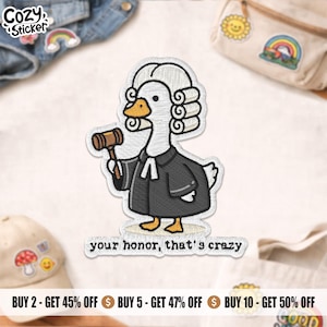 May include: Embroidered patch featuring a cartoon goose dressed as a judge, holding a gavel. The goose wears a black robe and a white wig. Text below reads "your honor, that's crazy". The patch has a white border and is on a light background.