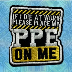 May include: Black and yellow embroidered patch with the text "If I die at work please place my PPE on me".