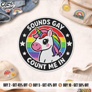 May include: Embroidered patch with a white unicorn, rainbow mane and horn, in a black border with white stars. The text "SOUNDS GAY COUNT ME IN" is displayed in a circular pattern. A fun, colourful design.