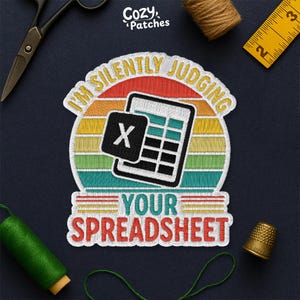 May include: Embroidered patch with the text "I'M SILENTLY JUDGING YOUR SPREADSHEET" featuring a calculator graphic. The patch has a retro sunset design with a black and white calculator icon and the letter "X".