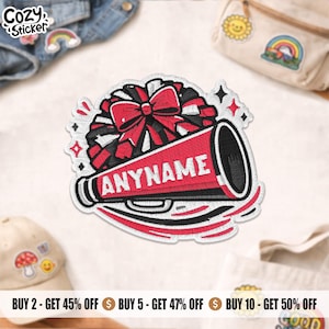 May include: Embroidered patch featuring a red and black megaphone with the text "ANYNAME" in white. A red bow and black and red pom-poms are above the megaphone. The patch has a white border with star accents. Cozy Sticker logo.