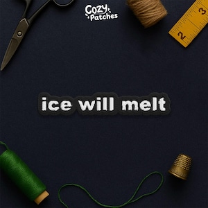 May include: A black embroidered patch with the words "ice will melt" in white, displayed on a dark blue surface. The patch is surrounded by sewing tools, including scissors, thread, and a thimble. The brand name "Cozy Patches" is in the top right corner.