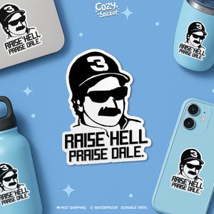 May include: Black and white sticker featuring a stylized portrait of a man wearing sunglasses and a baseball cap with the number 3. The text "RAISE HELL PRAISE DALE" is below the portrait. The sticker is displayed on a laptop, water bottle, tumbler, and phone.