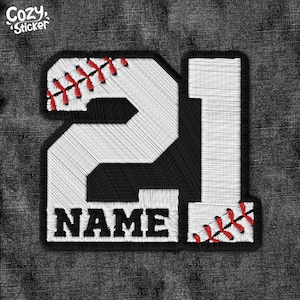 May include: White embroidered baseball jersey patch with the number 21 and the word "NAME" in black. The number has red stitching around the edges.