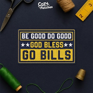 May include: Embroidered patch with the text "BE GOOD DO GOOD GOD BLESS GO BILLS" in white and yellow on a navy blue background. The patch is surrounded by sewing tools and thread.