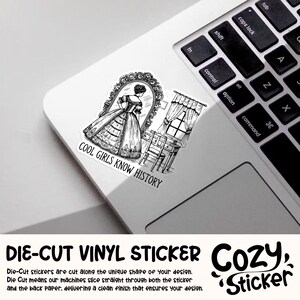 May include: Black and white die-cut vinyl sticker featuring a woman in a dress looking in a mirror with the text "Cool Girls Know History".
