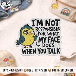 May include: Embroidered patch featuring a yellow bird with blue accents and the text "I'M NOT RESPONSIBLE FOR WHAT MY FACE DOES WHEN YOU TALK." The patch has a white border and is likely a sticker.